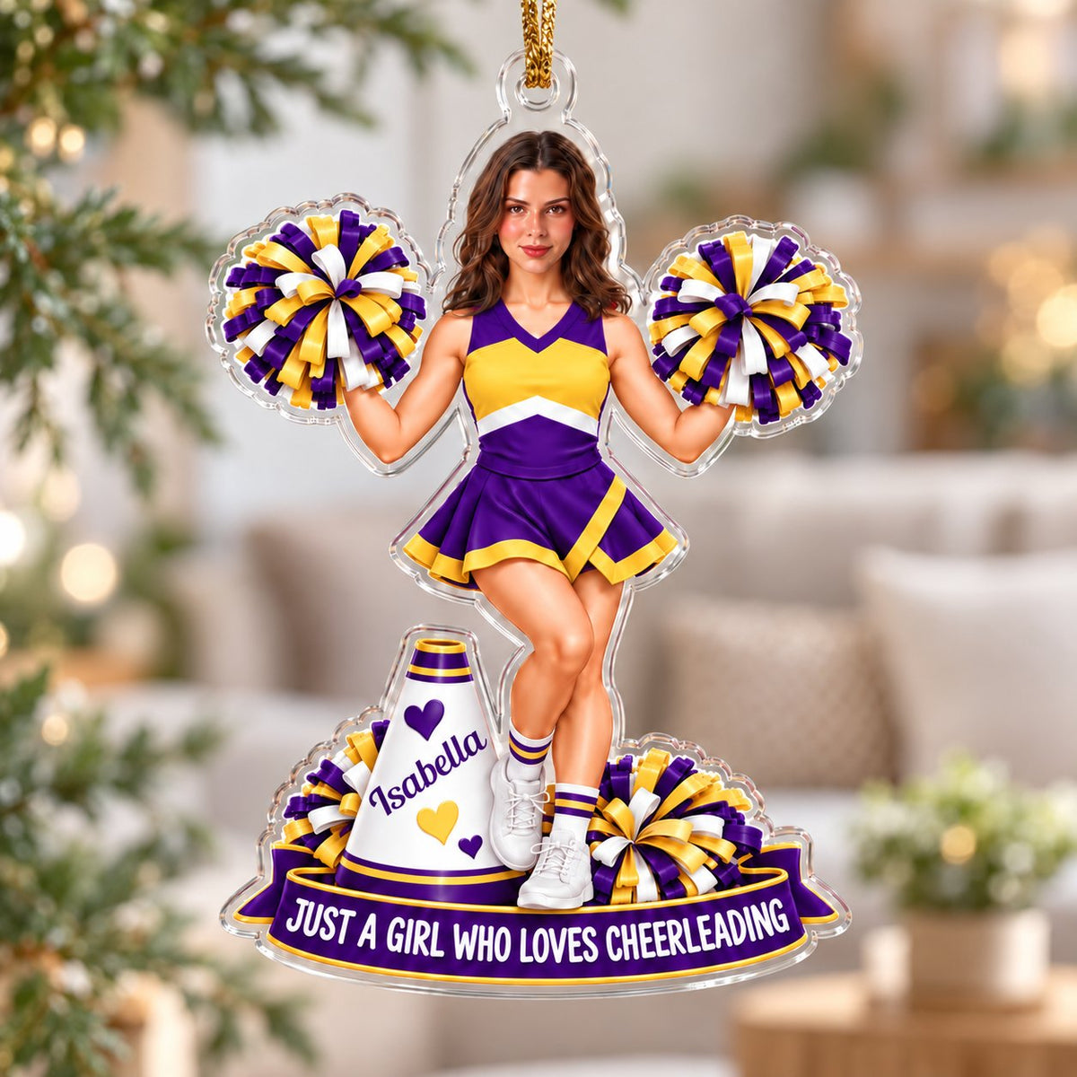 Custom-cut acrylic ornament of a cheerleader with pom-poms, megaphone, photo face, name banner and red ribbon.