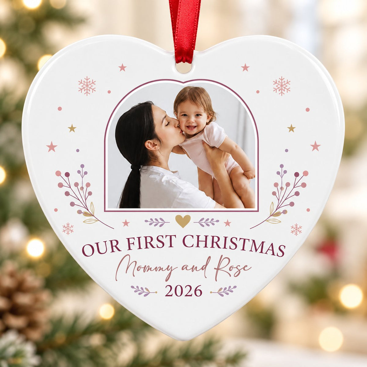 Heart ceramic ornament with “OUR FIRST CHRISTMAS”, arch photo frame, stars, snowflakes, berry sprigs, leafy flourishes,