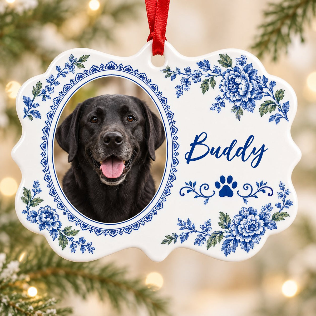 Scalloped medallion ornament with blue-green Delft floral border, dog photo left, blue paw print and name Buddy