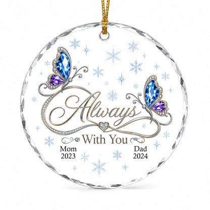 Round glass ornament with blue and purple jeweled butterflies, silver infinity heart, and light blue snowflakes.