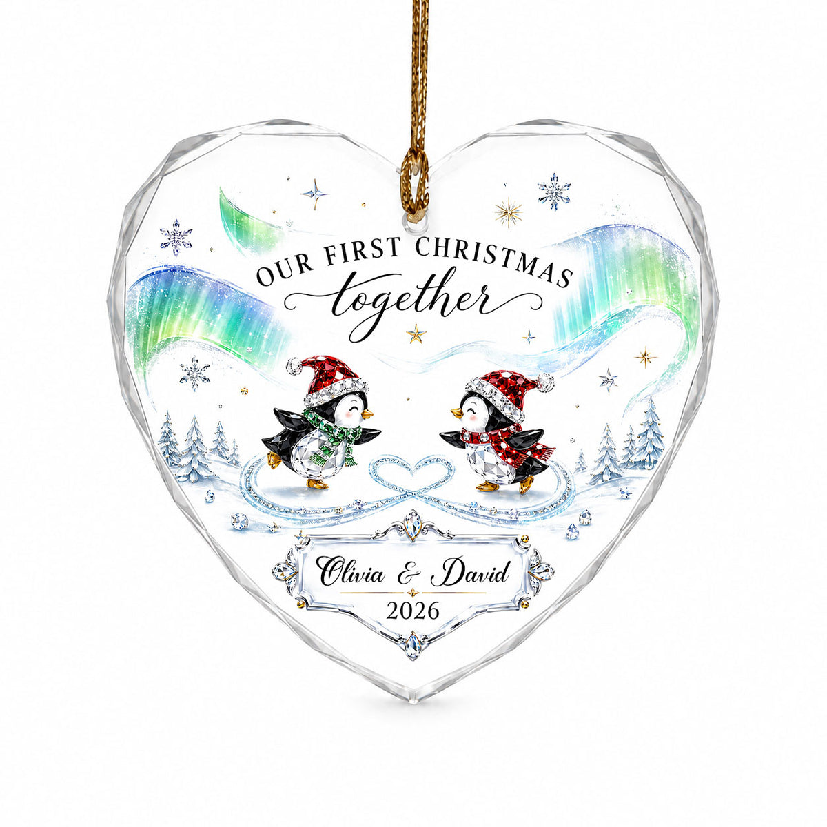 Heart glass ornament with two ice-skating penguins under green and blue aurora with names and date.