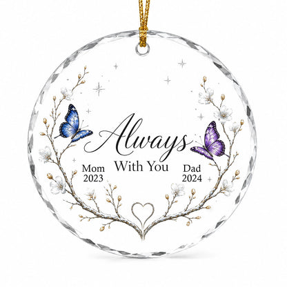 Round glass ornament with branch wreath, white blossoms, blue and purple butterflies, and Always With You text.