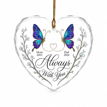 Heart-shaped glass ornament with stained-glass butterflies, gold dotted heart, and white-flower vines.