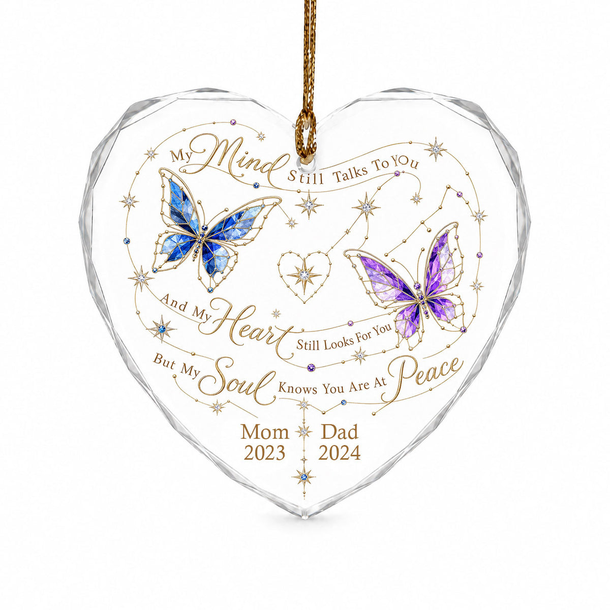 Heart-shaped glass ornament with blue and purple stained-glass butterflies, gold swirls, and memorial text.
