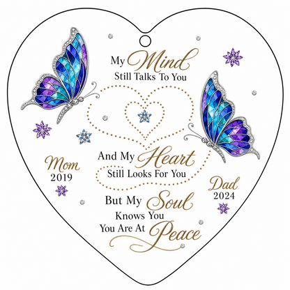 Heart glass ornament with two stained-glass butterflies, dotted heart trails, snowflakes, and a memorial quote.