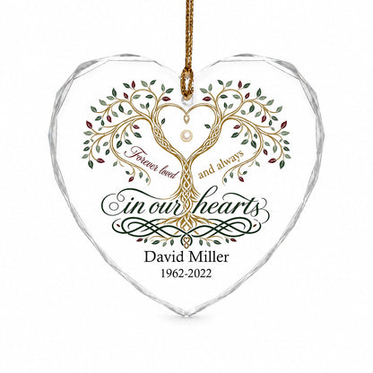 Heart glass ornament with a golden tree of life and the text 'Forever loved and always in our hearts'.