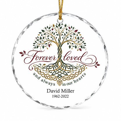 Round glass ornament with Celtic Tree of Life in green, gold and red, reading Forever loved and always in our hearts.