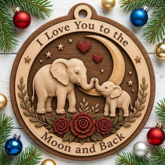 Round wood ornament with adult and baby elephants touching trunks under a crescent moon, red hearts, stars, and roses
