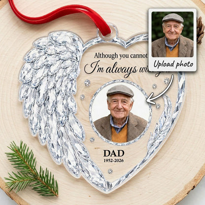 Clear acrylic heart ornament with crystal wing on the left, diamond accents, and a central circular photo frame.