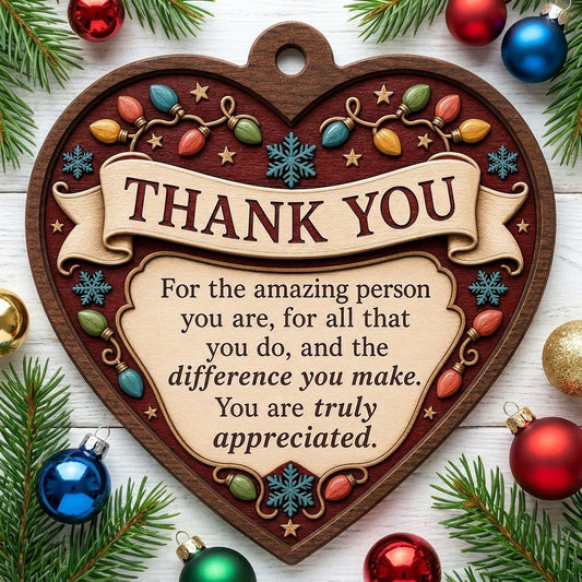 Heart-shaped wood ornament with THANK YOU message, string lights, snowflakes and stars on a burgundy background.