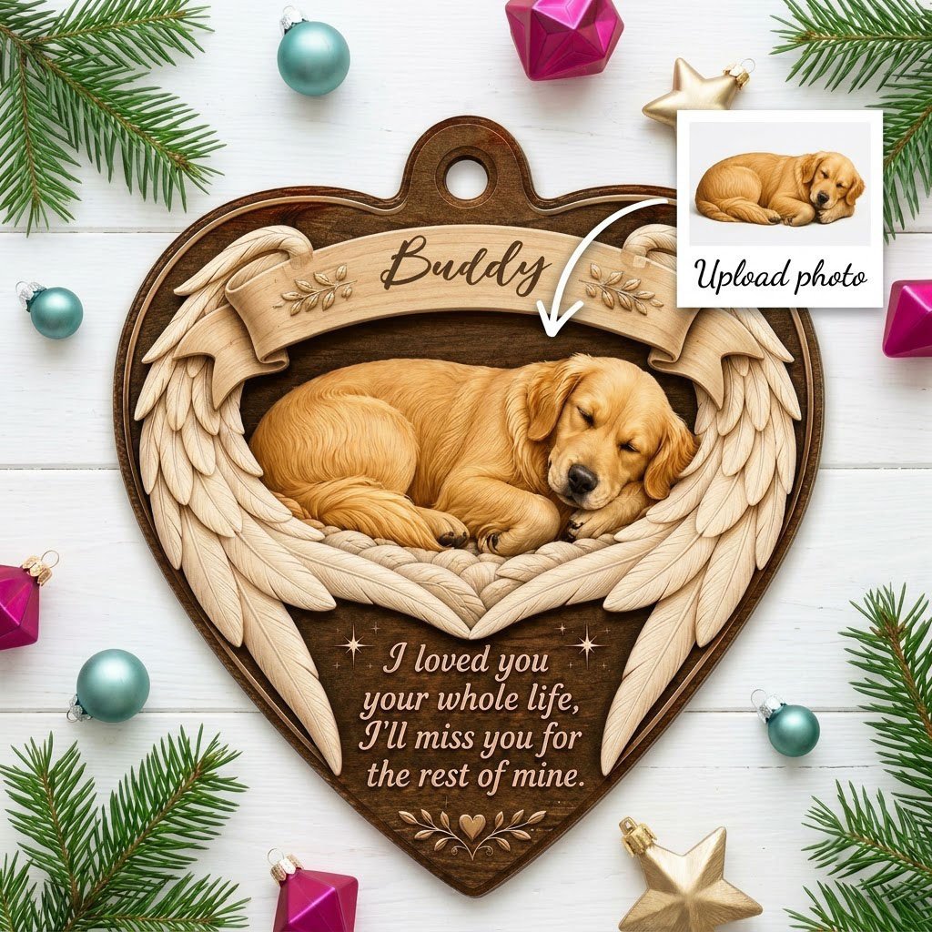 Heart-shaped wood ornament with a sleeping golden retriever, angel wings, ribbon banner, stars, and a memorial quote.