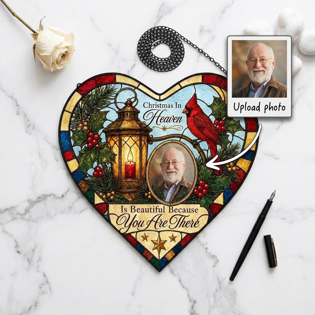 Heart stained glass suncatcher with lantern, red candle, red cardinal, holly, pine, and an oval photo frame.
