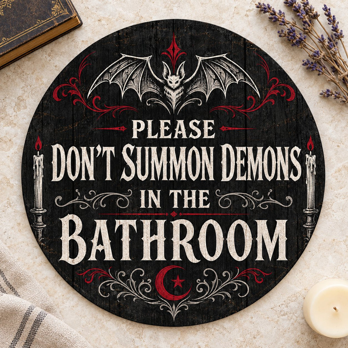 Round wooden sign with bat, filigree, candles and a crescent moon reading PLEASE DON'T SUMMON DEMONS IN THE BATHROOM.
