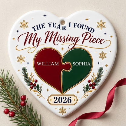 Heart ceramic ornament with red and green interlocking puzzle heart, gold snowflakes and stars, pine sprigs, and custom 