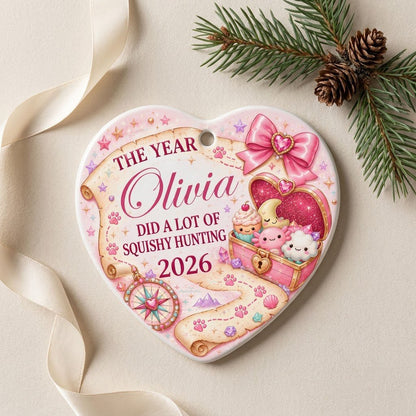 Heart ceramic ornament with a pastel treasure map, pink bow, compass, and a kawaii squishy-filled treasure chest.