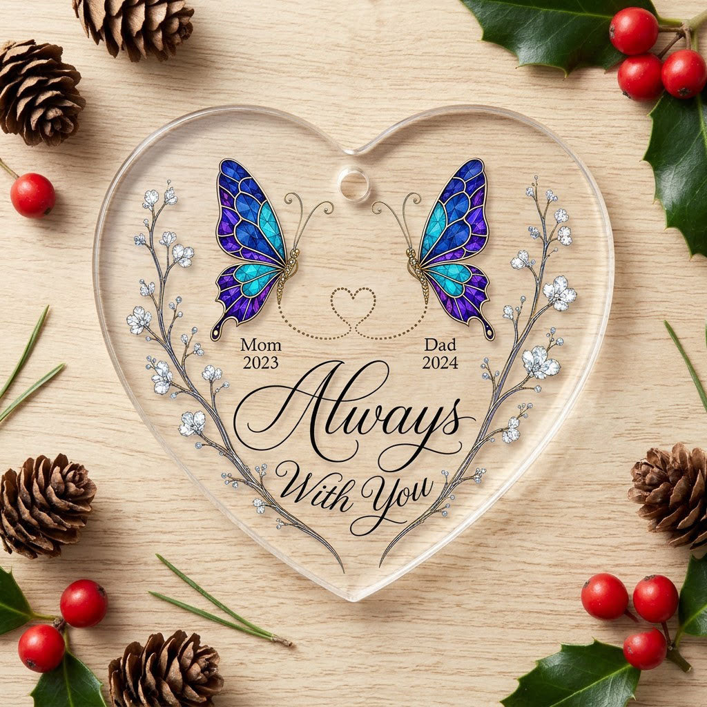 Heart-shaped glass ornament with stained-glass butterflies, gold dotted heart, and white-flower vines.