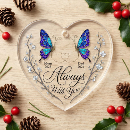 Heart-shaped glass ornament with stained-glass butterflies, gold dotted heart, and white-flower vines.