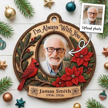 Bauble-shaped wood ornament with oval photo frame, red cardinal, pine, berries, and poinsettias with ribbon banner