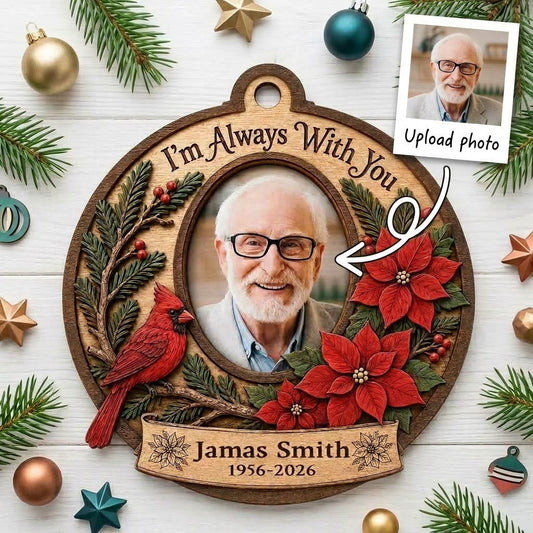 Bauble-shaped wood ornament with oval photo frame, red cardinal, pine, berries, and poinsettias with ribbon banner