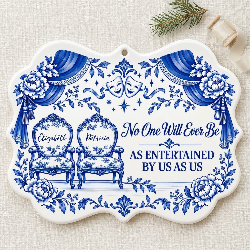 Blue-and-white ceramic ornament with theater masks, vintage chairs, Delft florals, and draped curtains.