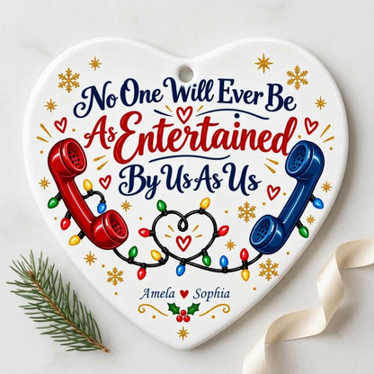 Heart ceramic ornament with red and blue vintage phones, heart-shaped Christmas lights, gold snowflakes and holly.