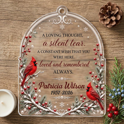 Clear acrylic arch ornament with two red cardinals, snowy evergreens, memorial verse, plus personalized name and dates.