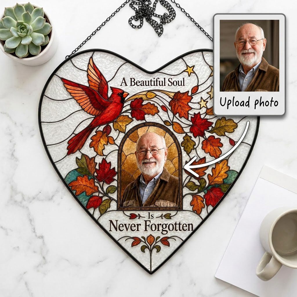 Heart stained glass suncatcher with flying red cardinal, autumn leaves, gold stars, and a central photo frame.