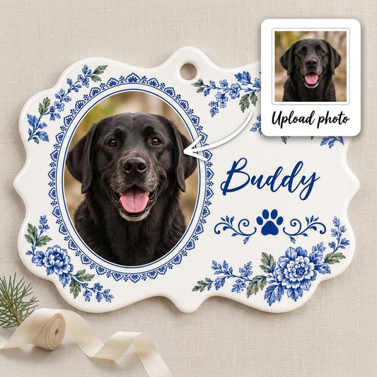 Scalloped medallion ornament with blue-green Delft floral border, dog photo left, blue paw print and name Buddy
