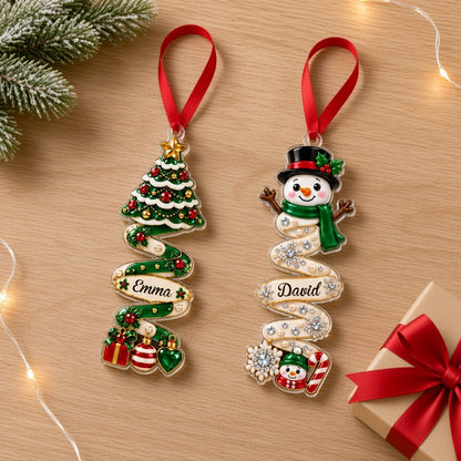 Custom-cut acrylic ornament with a ribbon tree or snowman on a spiral ribbon, personalized with a name on the ribbon.