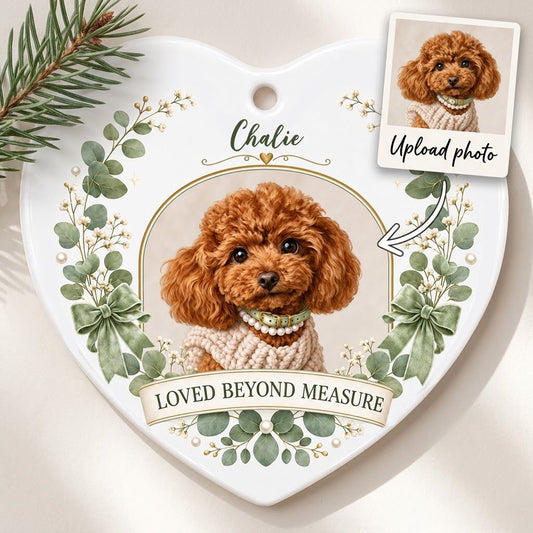 Heart ceramic ornament with dog photo in gold frame, eucalyptus wreath, green bows and 'LOVED BEYOND MEASURE' text
