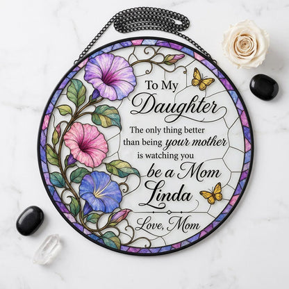 Stained glass–style round suncatcher with three morning glories, two yellow butterflies, and a purple-blue mosaic border