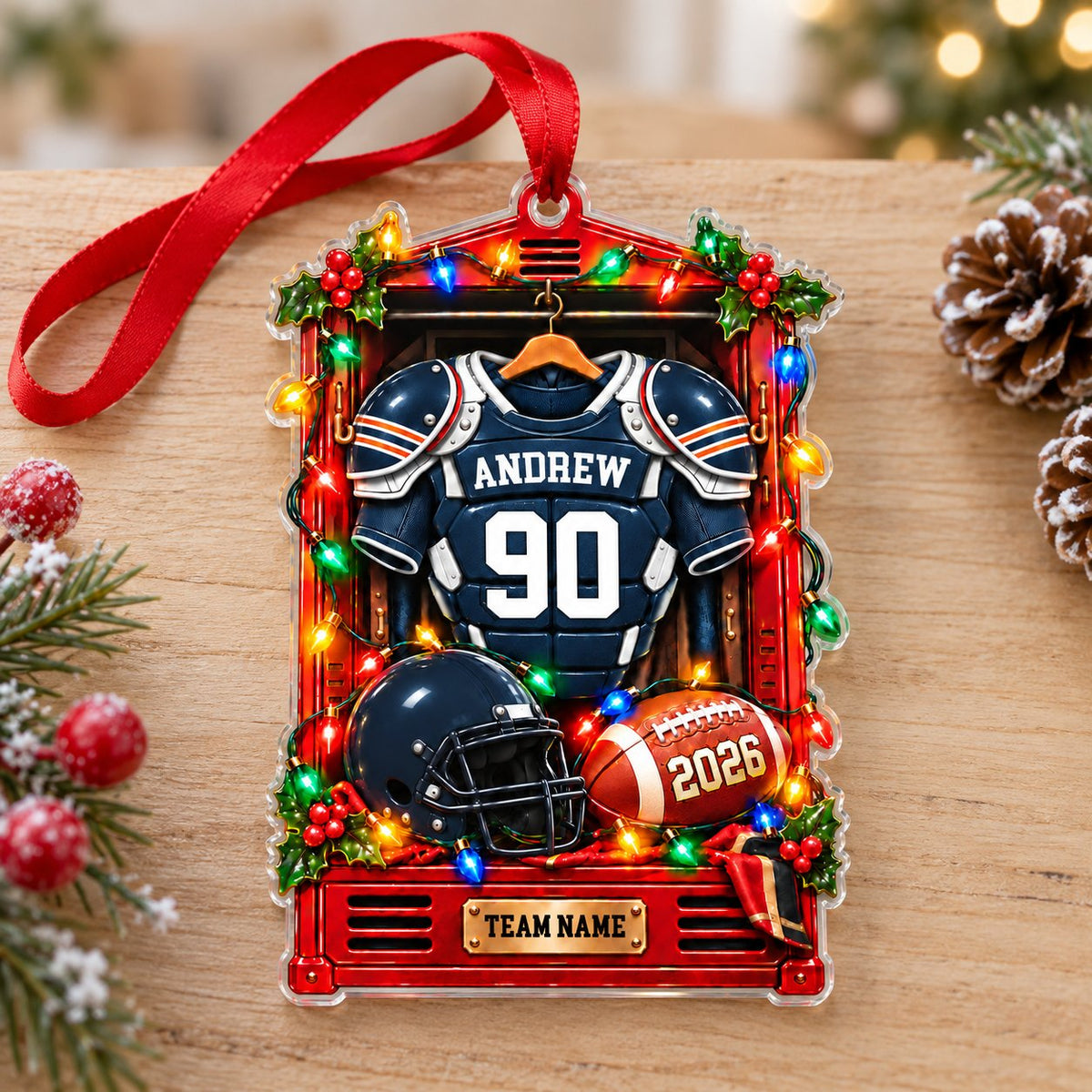 A red sports locker ornament with a football jersey, helmet, ball, holly, and Christmas lights on a custom-cut acrylic s