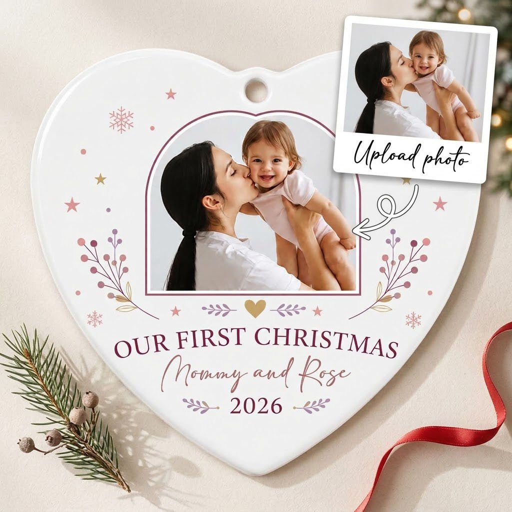 Heart ceramic ornament with “OUR FIRST CHRISTMAS”, arch photo frame, stars, snowflakes, berry sprigs, leafy flourishes, 