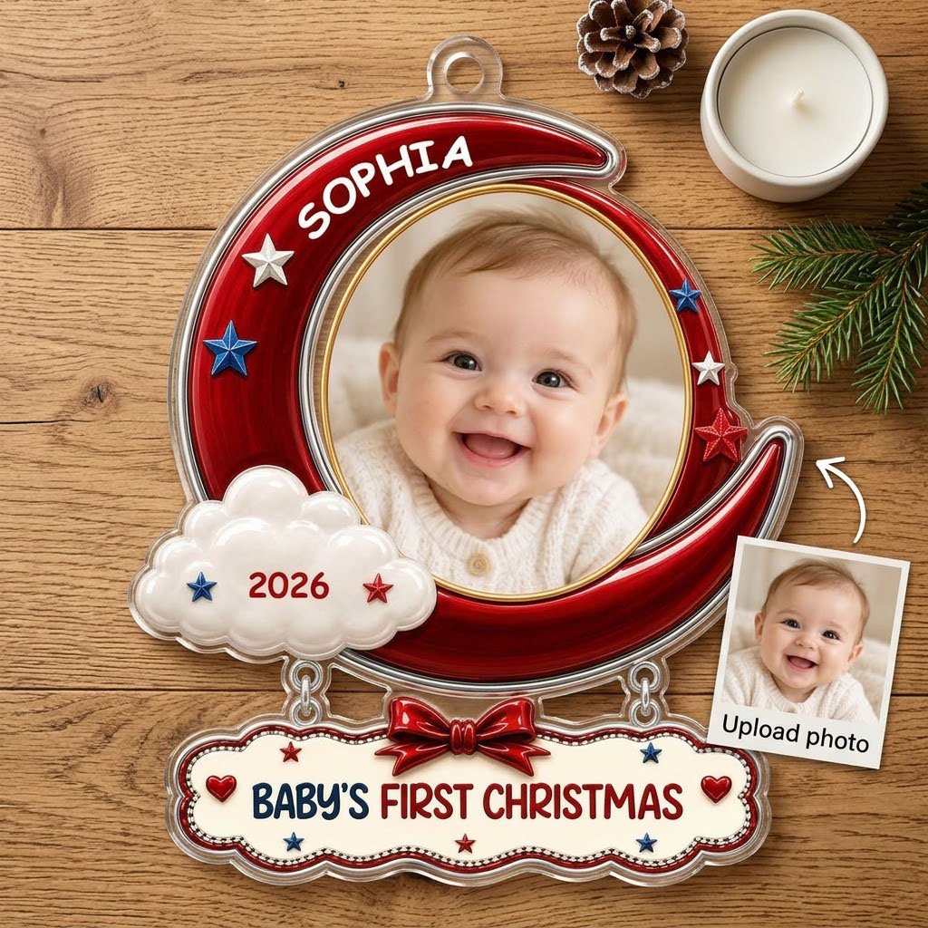 Red crescent moon acrylic ornament with baby photo, cloud, stars, and a plaque reading Baby's First Christmas.