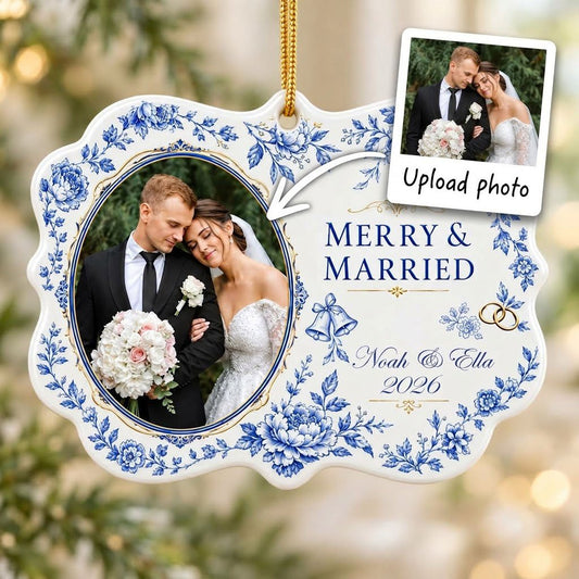 Scalloped ceramic ornament with blue floral border, 'MERRY & MARRIED', gold rings and bells, and a couple photo frame.