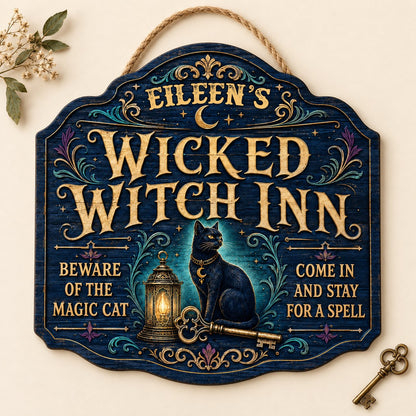 Custom-cut wooden sign with black cat, glowing lantern, golden key, crescent moons, stars, and Wicked Witch Inn text
