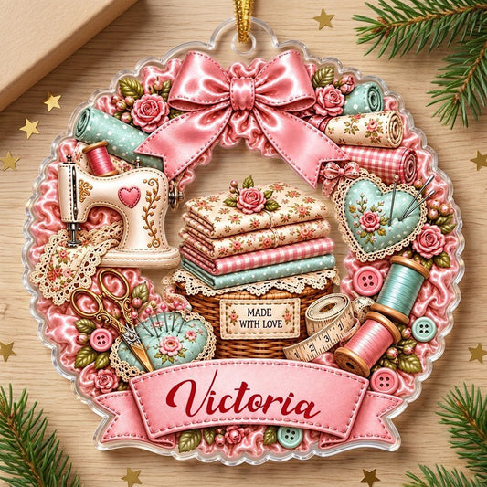 Acrylic ornament shaped like a scalloped wreath with sewing machine, scissors, fabrics, and 'MADE WITH LOVE' banner with