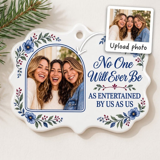 Blue floral ceramic ornament with navy photo frame and the text No One Will Ever Be As Entertained By Us As Us.
