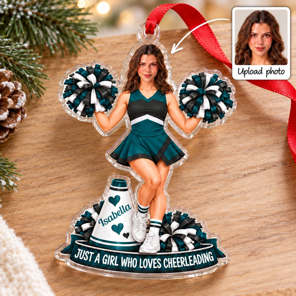 Custom-cut acrylic ornament with a cheerleader photo, teal and black pom-poms, megaphone, and a teal name banner.