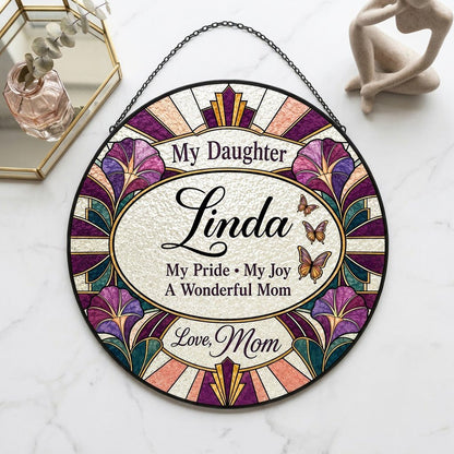 Round stained-glass style suncatcher with purple flowers, butterflies, and 'My Daughter' text.