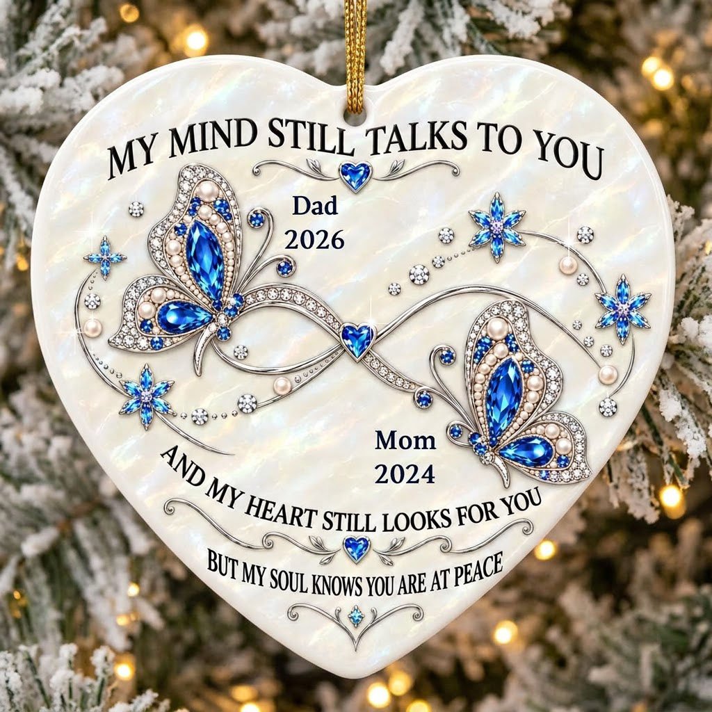 Heart ceramic ornament with blue jeweled butterflies, a silver infinity, and quote 'My Mind Still Talks To You'.