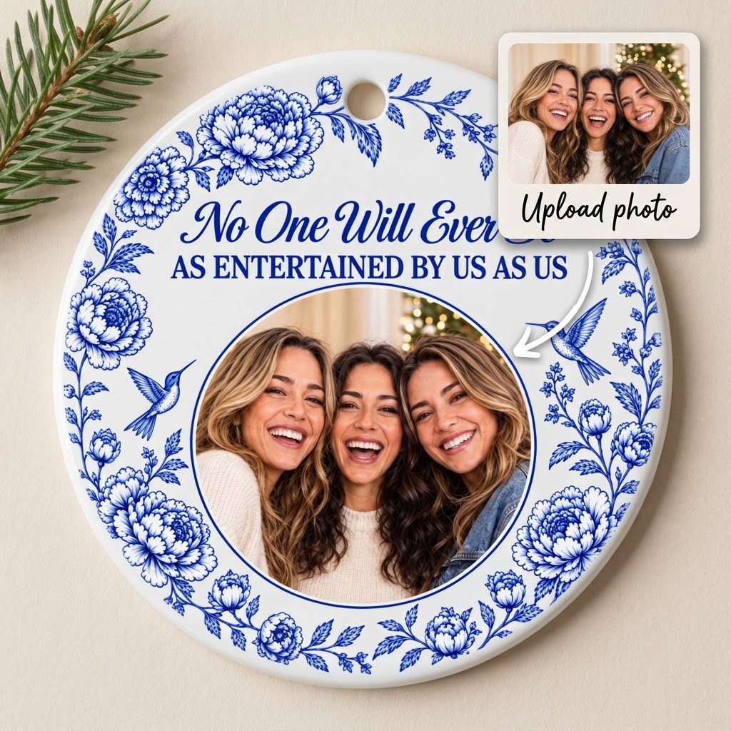 Round white ceramic ornament with blue floral border, two hummingbirds and a central circular photo frame with friends.