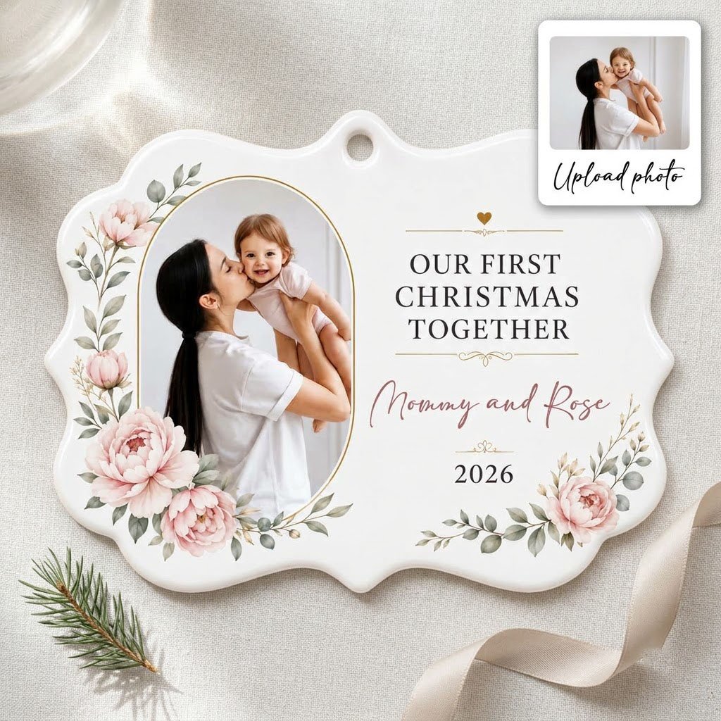 White scalloped ceramic ornament with gold oval photo frame, pink peonies, and Our First Christmas Together text.