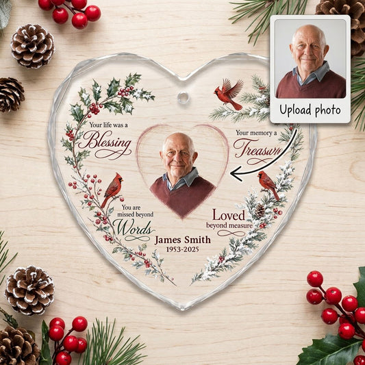 Heart glass ornament with a photo, red cardinals, and a winter wreath of pine, holly, berries, and pinecones.