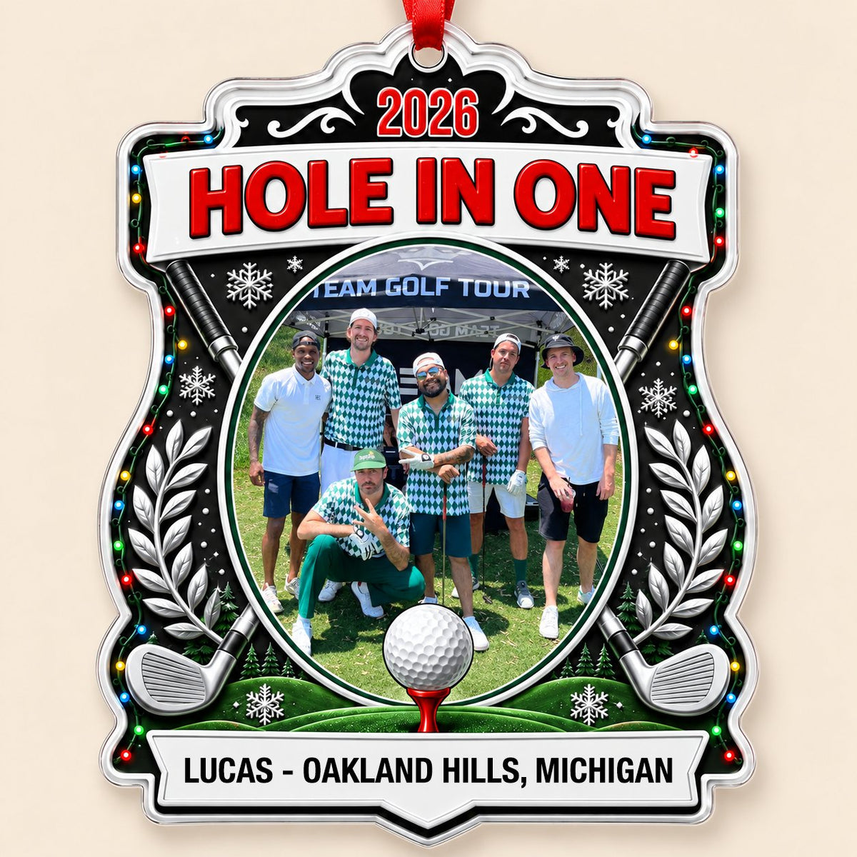 Acrylic crest ornament with golf photo, crossed clubs, Christmas lights, snowflakes, and HOLE IN ONE 2026 text.
