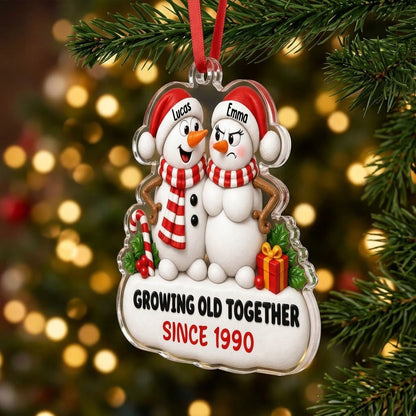 Custom-cut acrylic ornament of a snowman couple with candy cane, gift box, and Growing Old Together text on a snowy base