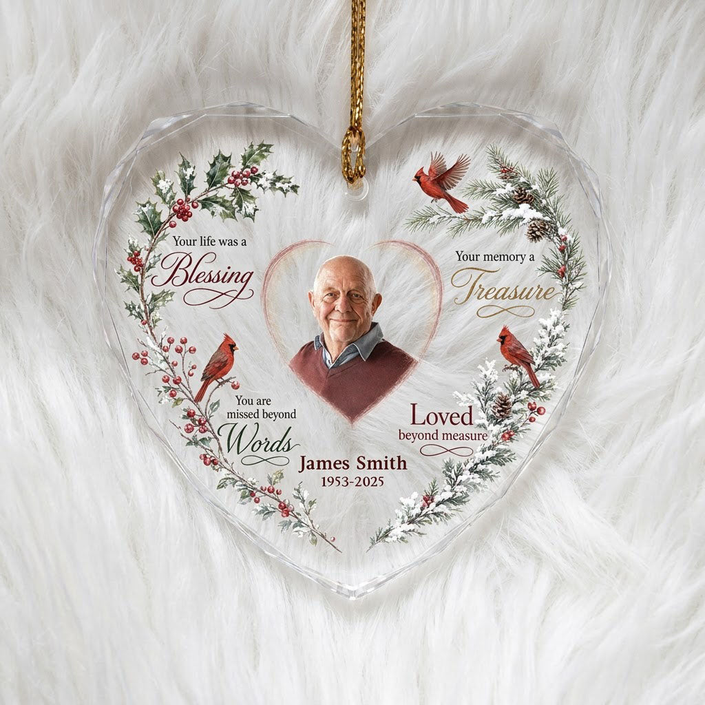 Heart glass ornament with a photo, red cardinals, and a winter wreath of pine, holly, berries, and pinecones.