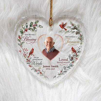 Heart glass ornament with a photo, red cardinals, and a winter wreath of pine, holly, berries, and pinecones.