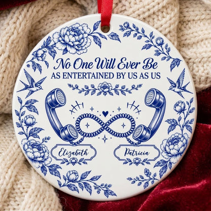 Blue toile round ornament with crown, swallows, vintage phones in an infinity and two name banners