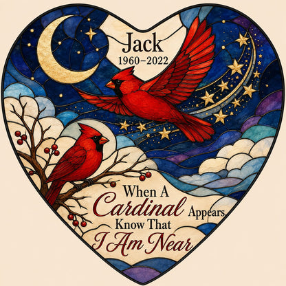 Heart stained-glass suncatcher with two red cardinals, a crescent moon, stars, and a branch with red berries.
